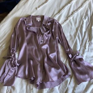 100% silk top new and only worn once.